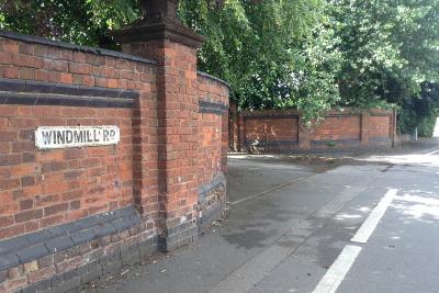 Windmill Road cemetery street sign and entrance to cemetery